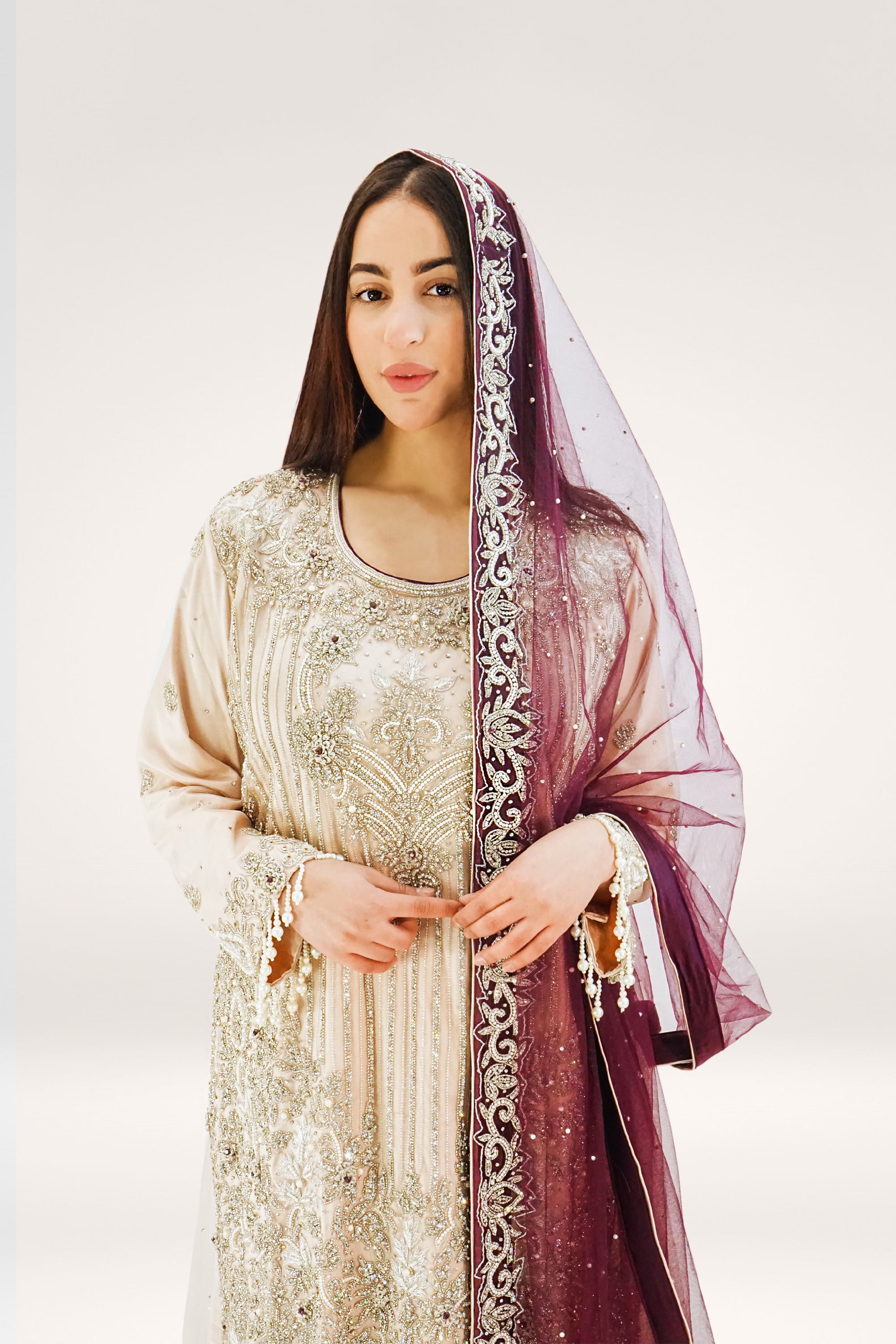 Elegant Peach Soft Net Lehenga with Pearl Tassels