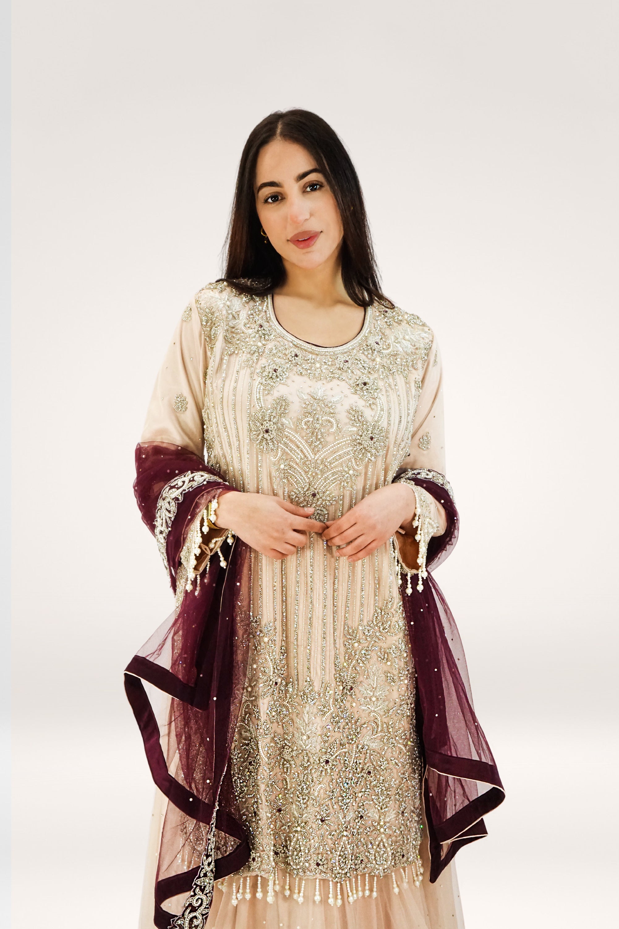 Elegant Peach Soft Net Lehenga with Pearl Tassels