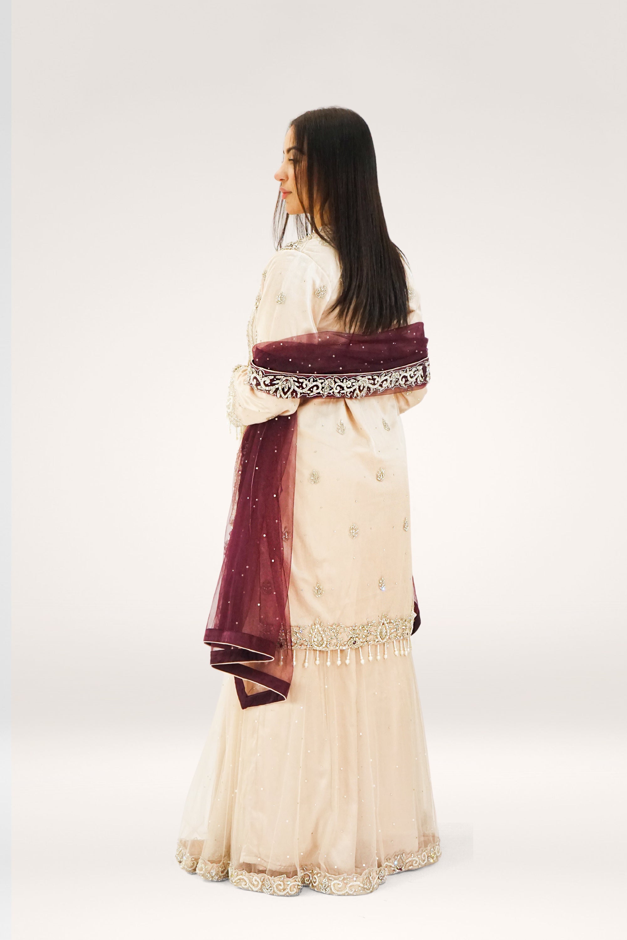 Elegant Peach Soft Net Lehenga with Pearl Tassels