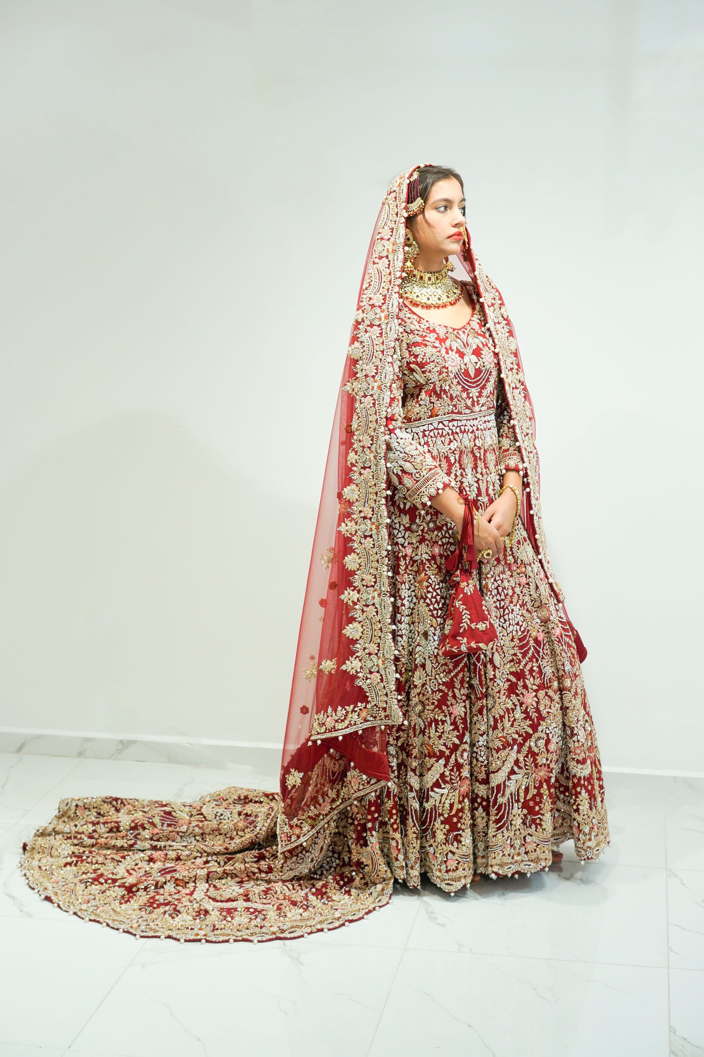 Red Traditional Bridal Gown with Long Trail